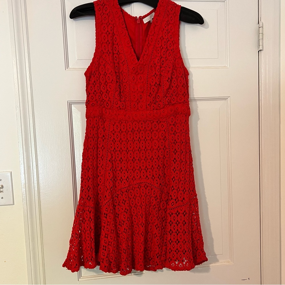 Red crochet mini dress. Fit and flare.